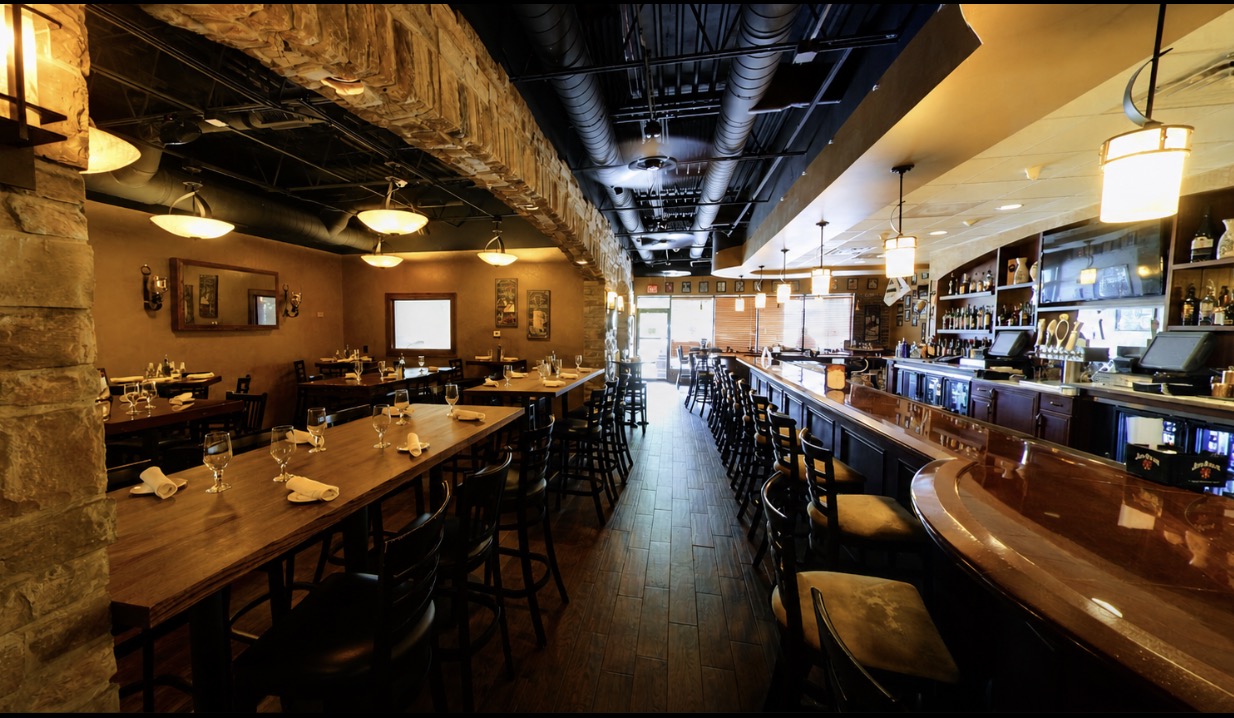 Angeli's Bar Area with full bar and seating